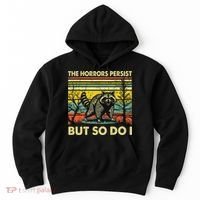 Funny The Horrors Persist But So Do Raccoon Meme Sarcastic Hoodie thumb 0
