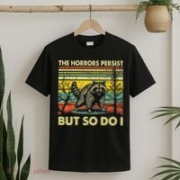 Funny The Horrors Persist But So Do Raccoon Meme Sarcastic T-Shirt thumb 2