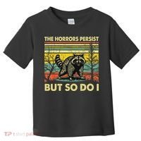 Funny The Horrors Persist But So Do Raccoon Meme Sarcastic Toddler T-Shirt thumb 0