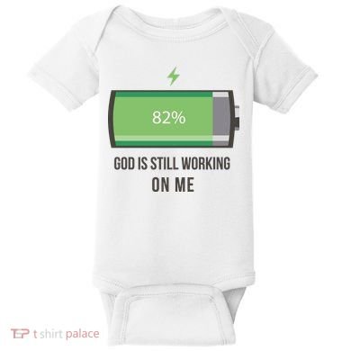 God Is Still Working On Me Battery Loading Baby Bodysuit