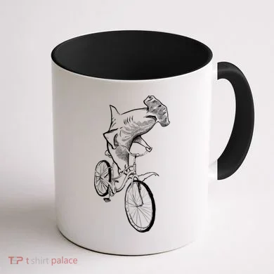 Hammerhead Shark Riding Bicycle Coffee Mug back