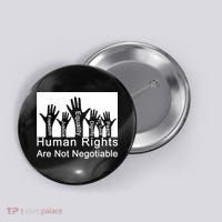Human Rights Are Not Negotiable Button thumb 0