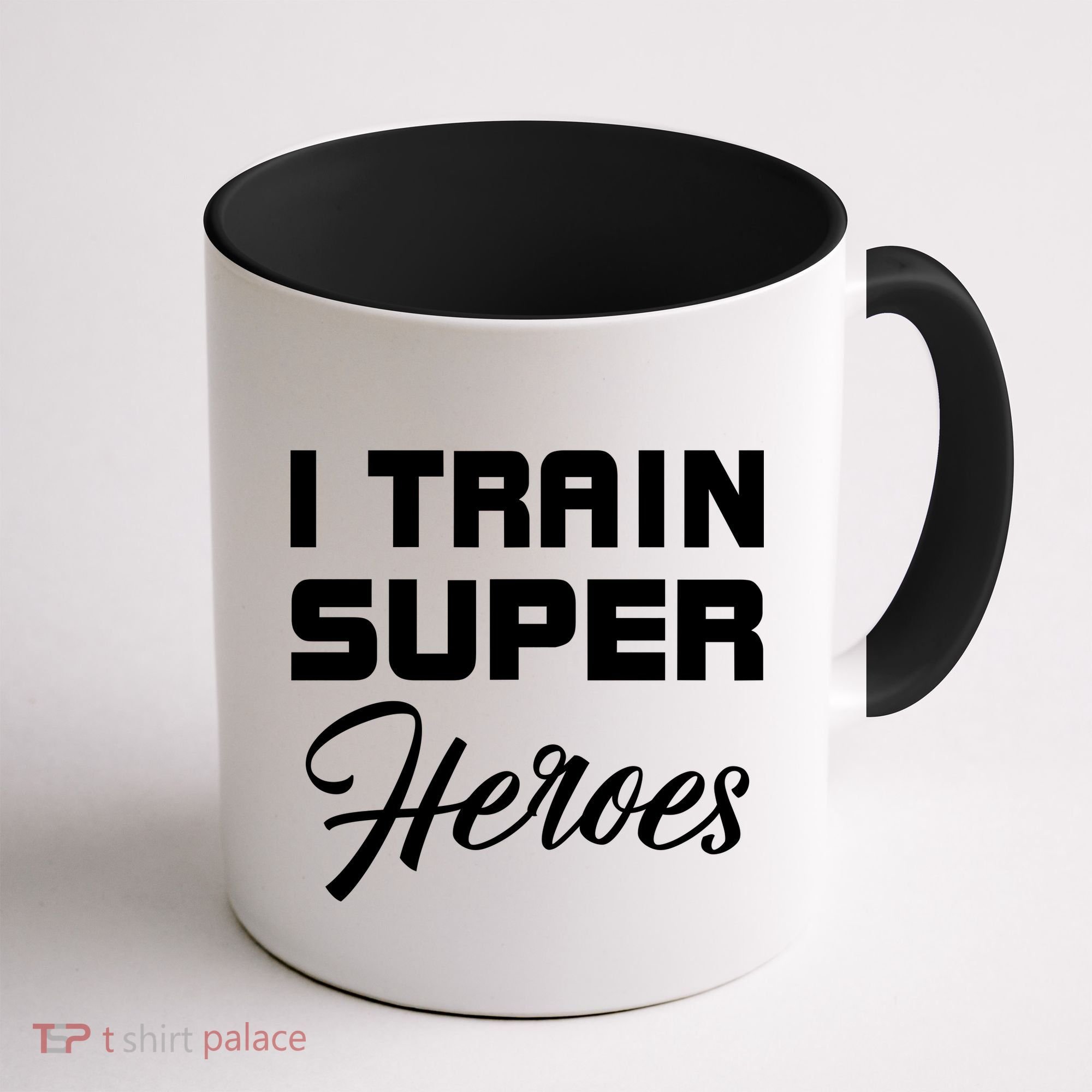 I Train Super Heroes Coffee Mug