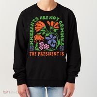 Immigrants Are Not Criminal But The President Is Boho Women's Sweatshirt thumb 0
