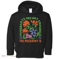 Immigrants Are Not Criminal But The President Is Boho Toddler Hoodie thumb 0