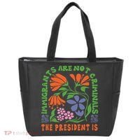 Immigrants Are Not Criminal But The President Is Boho Tote Bag thumb 0