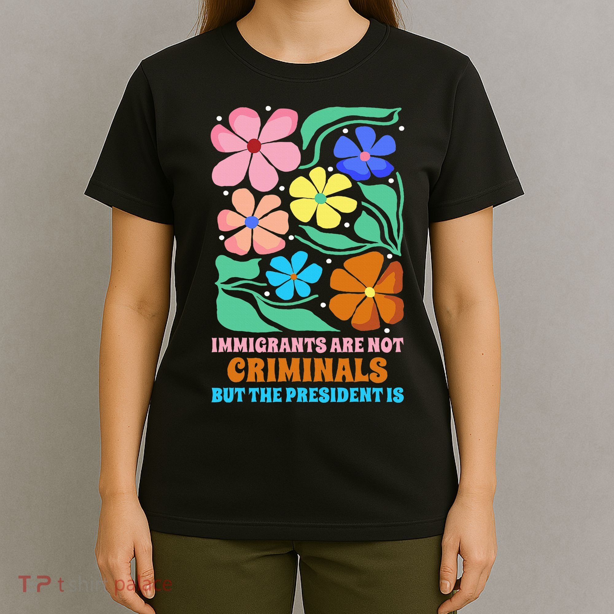 Immigrants Are Not Criminals But The President Is  T-Shirt