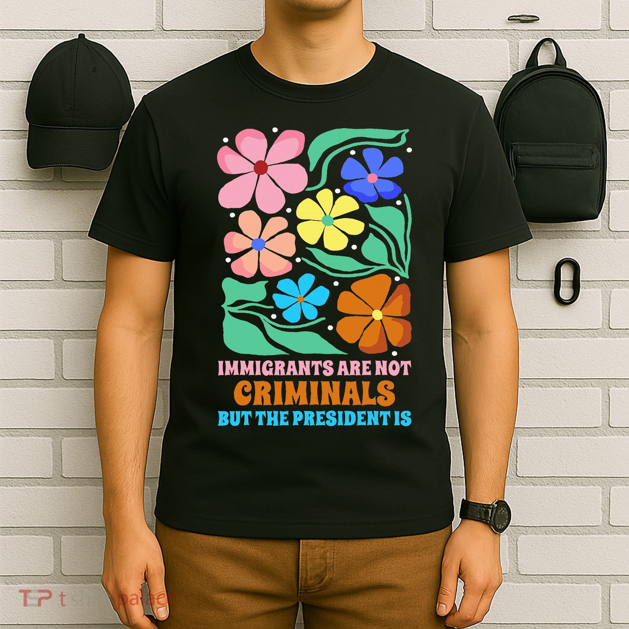 Immigrants Are Not Criminals But The President Is  T-Shirt
