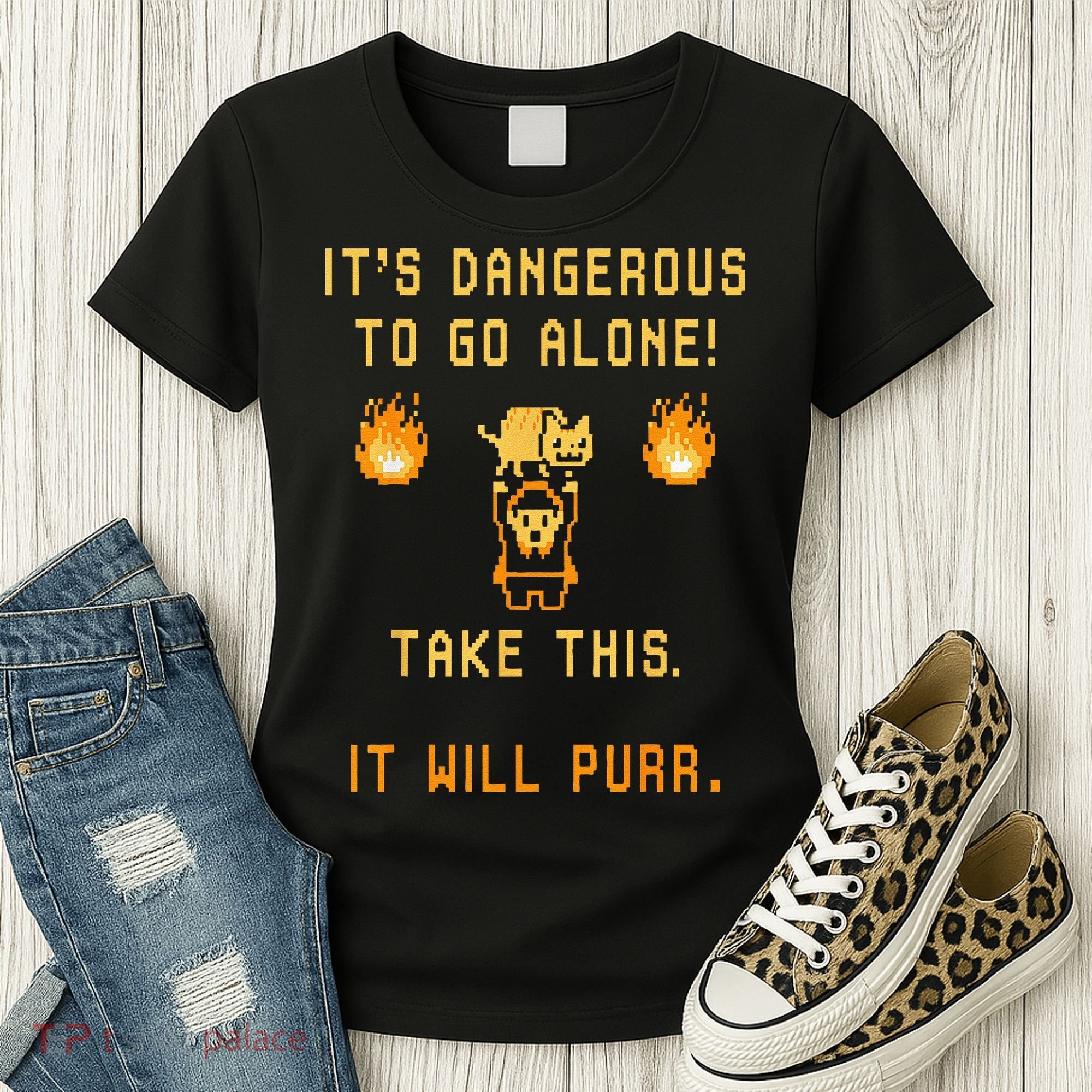 ITS DANGEROUS TO GO ALONE! TAKE THIS. IT WILL PURR. Women's T-Shirt