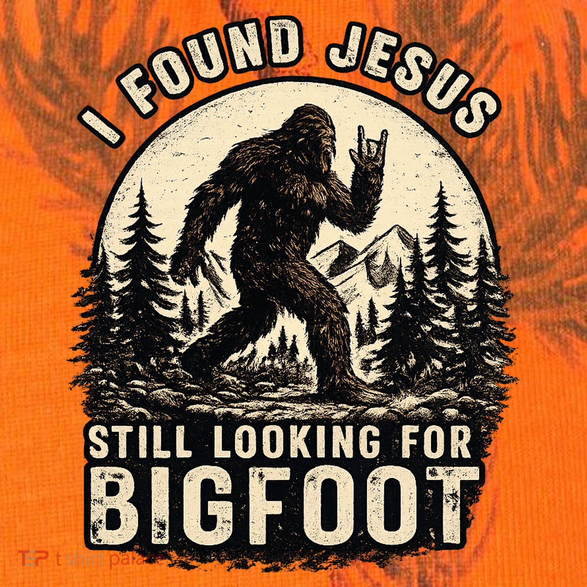 I Found Jesus Still Looking Bigfoot Retro Funny Christian Kati Licensed 12" Camo Cuffed Beanie