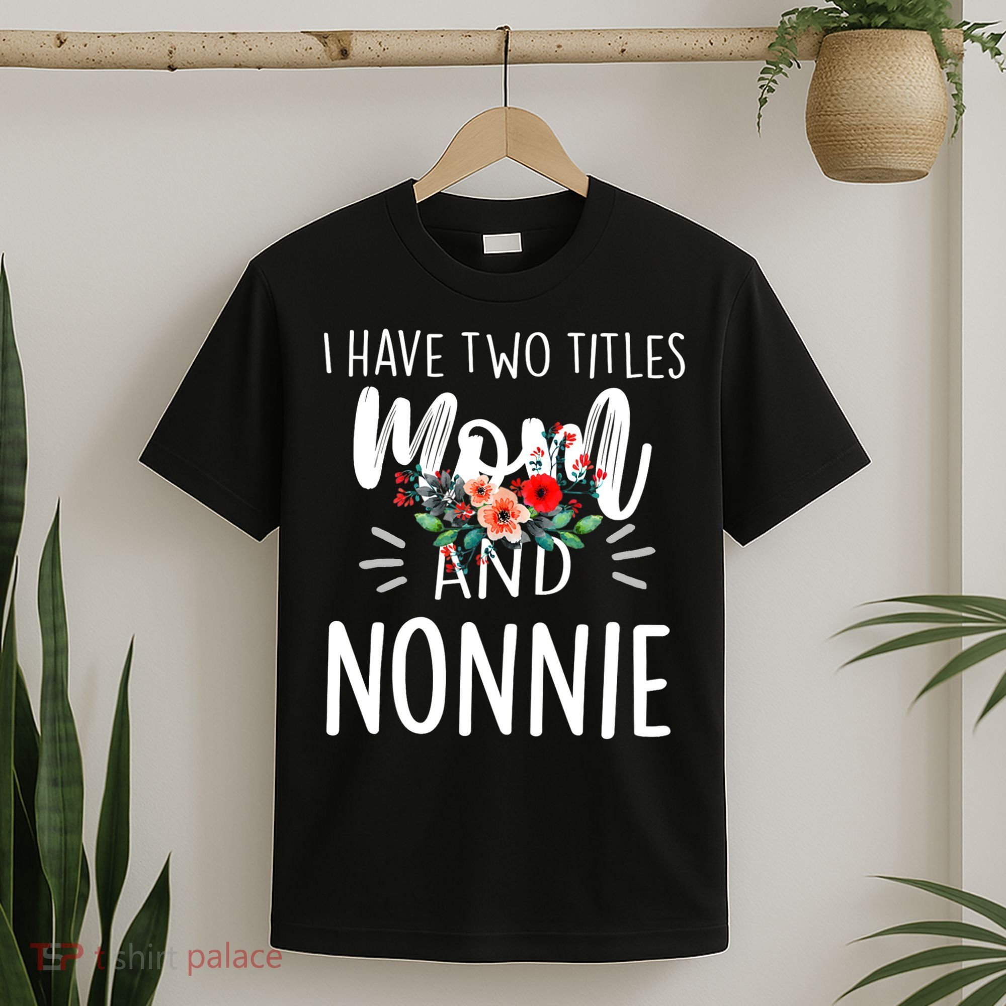I have two titles Mom and Nonnie I rock them both Floral T-Shirt