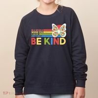 In A World Where You Can Be Anything Be Kind Autism Awareness Women's Sweatshirt thumb 0