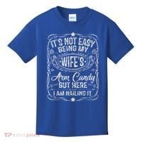 Its Not Easy Being My Wifes Arm Candy Fathers Day Kids T-Shirt thumb 0