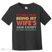 ItS Not Easy Being My WifeS Arm Candy Retro Funny Husband Toddler T-Shirt thumb 0