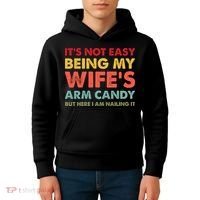 ItS Not Easy Being My WifeS Arm Candy Retro Funny Husband Kids Hoodie thumb 4