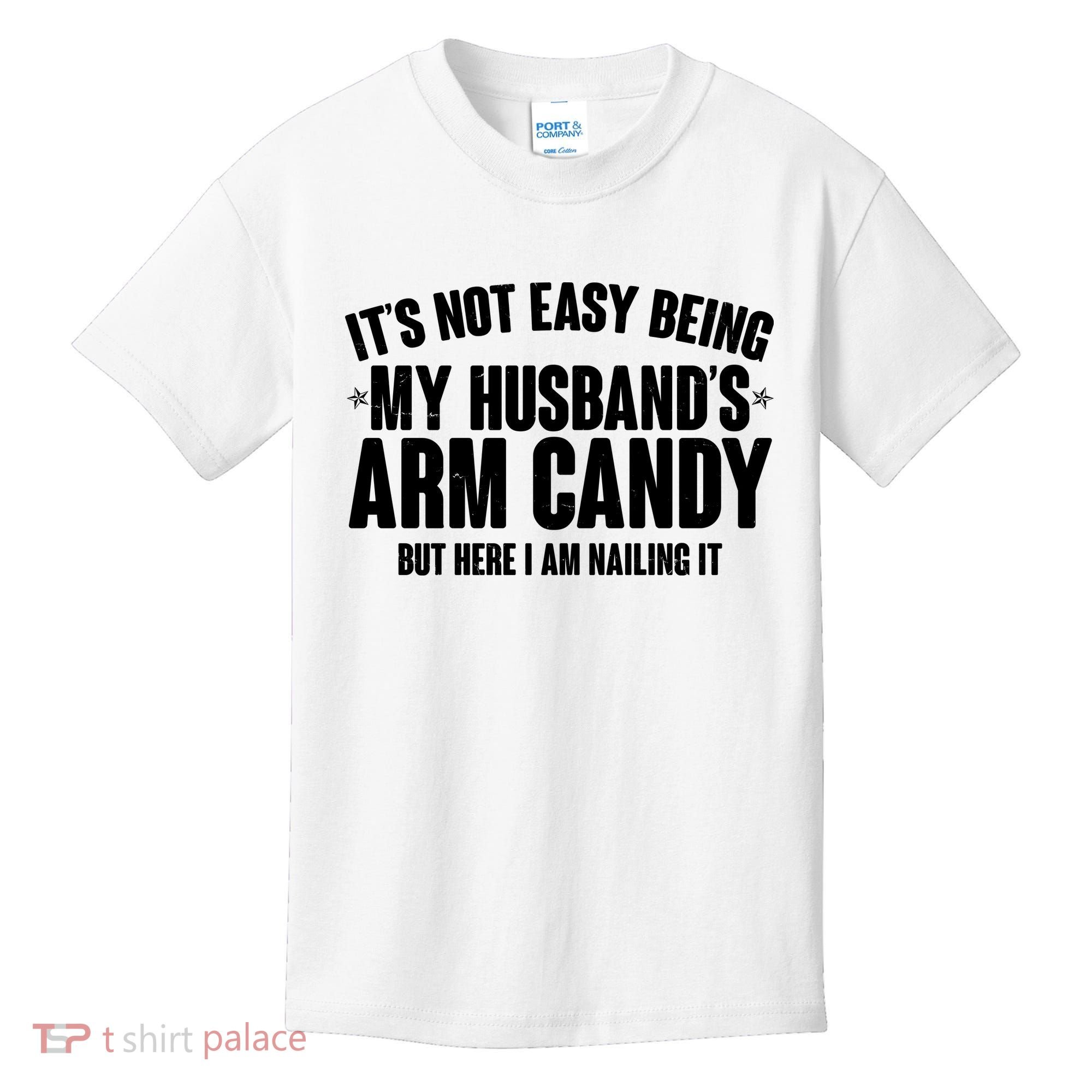It's Not Easy Being My Husband's Arm Candy But Here I Am Nailing It Kids T-Shirt