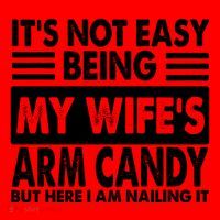 Its Not Easy Being My Wifes Arm Candy But Here I Am Nailing It Funny Santa Hat thumb 1