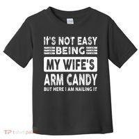 Its Not Easy Being My Wifes Arm Candy But Here I Am Nailin  Toddler T-Shirt thumb 0