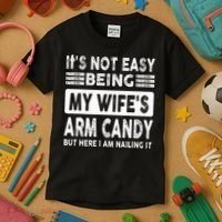 Its Not Easy Being My Wifes Arm Candy But Here I Am Nailin  Kids T-Shirt thumb 3