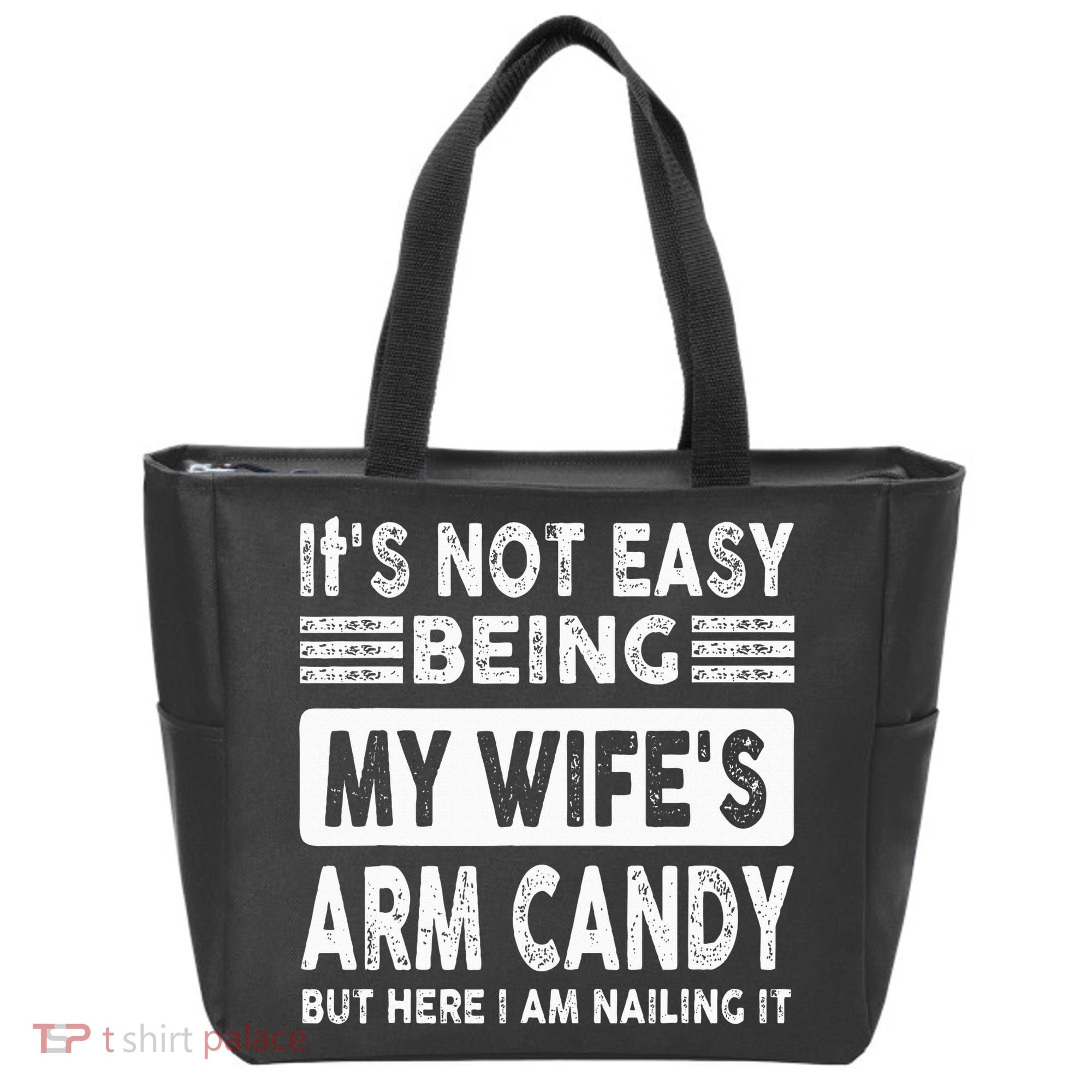 Its Not Easy Being My Wifes Arm Candy But Here I Am Nailin  Tote Bag