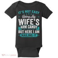 Its Not Easy Being My Wife's Arm Candy Funny Husband Baby Bodysuit thumb 0