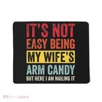 It's Not Easy Being My Wife's Arm Candy but here i am nailin Mousepad thumb 0