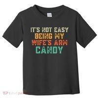 It's Not Easy Being My WIfes Arm Candy Hilarious Husband Toddler T-Shirt thumb 0
