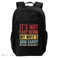 Its Not Easy Being My Wifes Arm Candy But Here I Am Nailin Backpack thumb 0