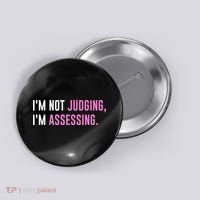 I'm Not Judging I'm Assessing Funny Button thumb 0
