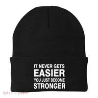 It Never Gets Easier You Just Become Stronger Beanie thumb 0