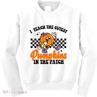 I Teach The Cutest Pumpkins Retro Teacher Halloween Kids Sweatshirt thumb 0