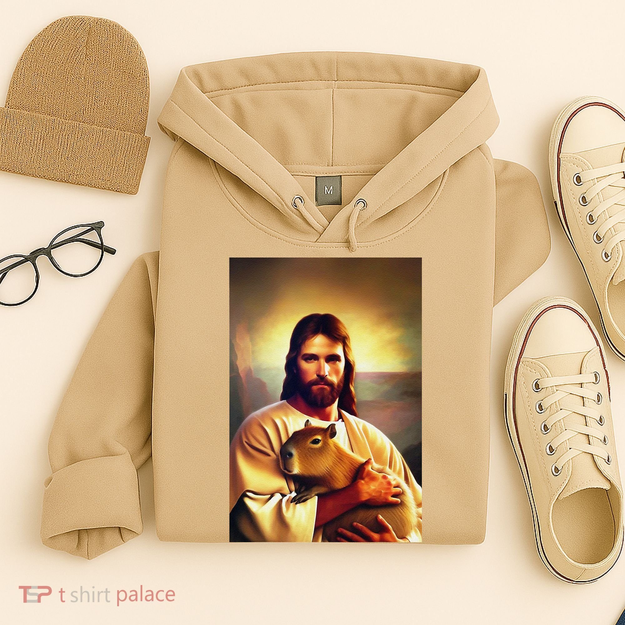 Jesus Holding A Capybara Hoodie