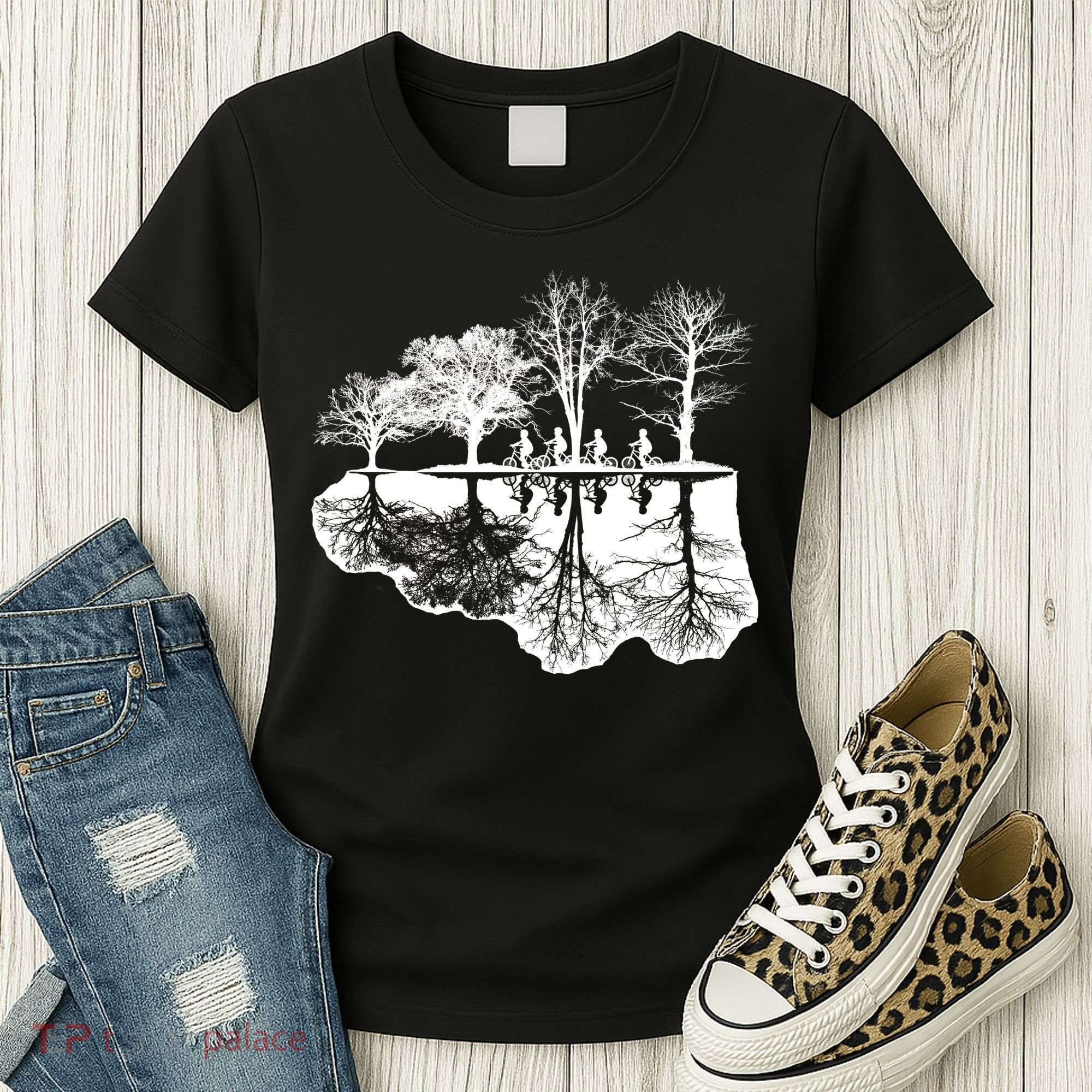 Kids Riding Bikes Through Trees Upside Down Women's T-Shirt