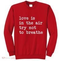 Love Is In The Air Try Not To Breathe Funny Valentines Day Sweatshirt thumb 0