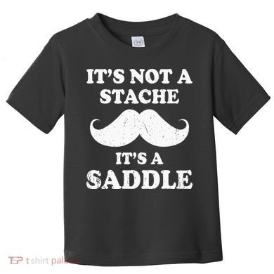 Mustache ItS Not A Stache ItS A Saddle Moustache Ride Toddler T-Shirt