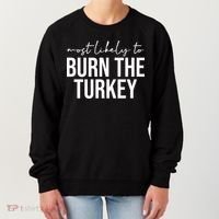Most Likely To Burn The Turkey Funny Thanksgiving Women's Sweatshirt thumb 0