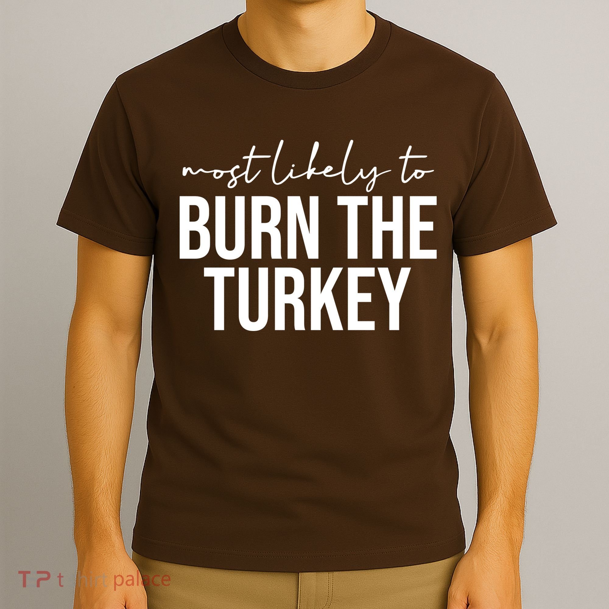 Most Likely To Burn The Turkey Funny Thanksgiving T-Shirt