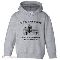 My Tummy Hurts But IM Being Brave About It Toddler Hoodie thumb 0