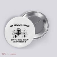 My Tummy Hurts But IM Being Brave About It Button thumb 0