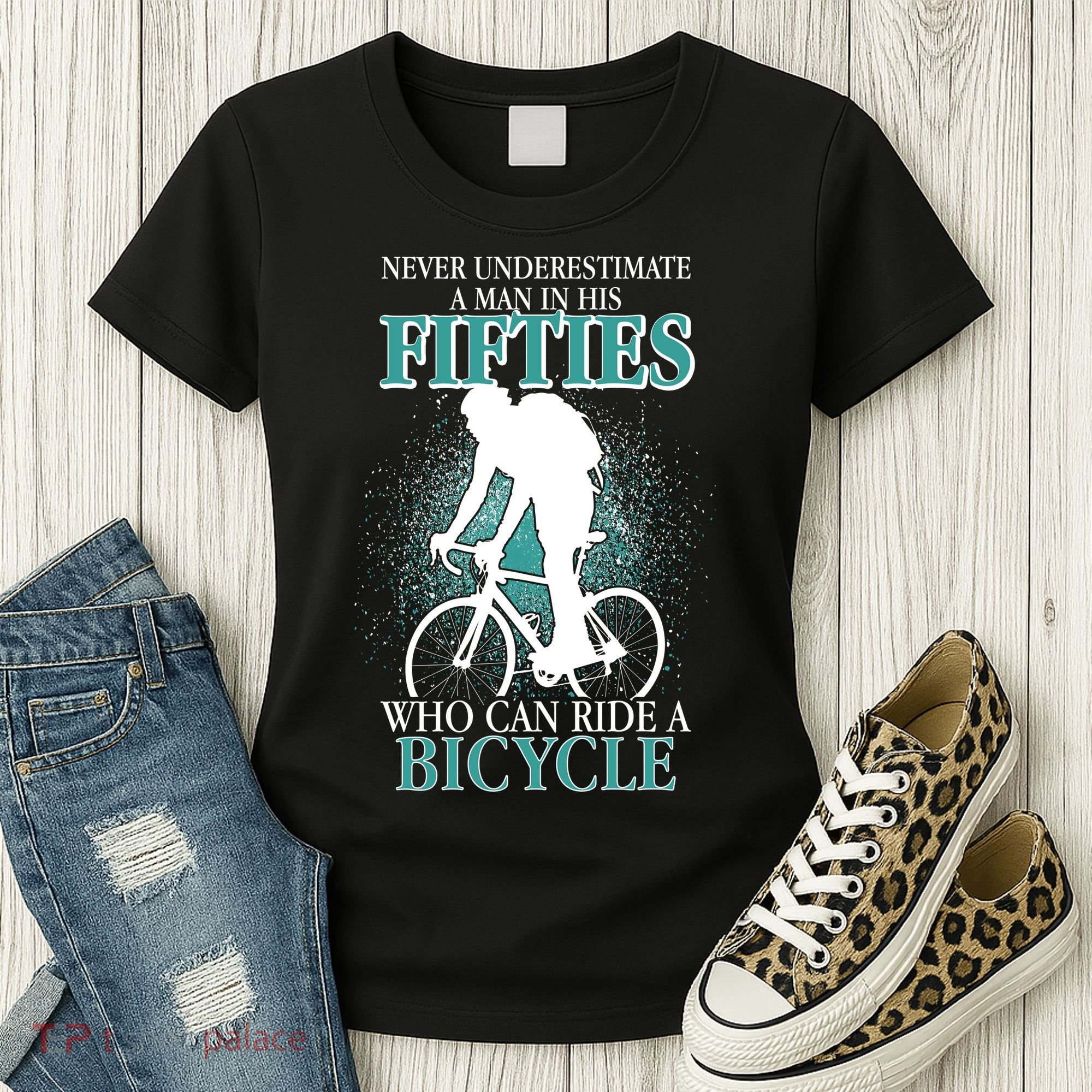 Never Underestimate A Man In His Fifties Who Can Ride A Bicycle Women's T-Shirt