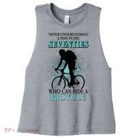 Never Underestimate A Man In His Seventies Who Can Ride A Bicycle Women's Racerback Cropped Tank thumb 0