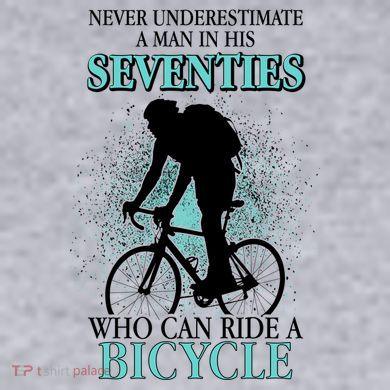 Never Underestimate A Man In His Seventies Who Can Ride A Bicycle Women's Racerback Cropped Tank
