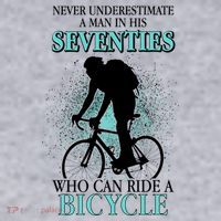 Never Underestimate A Man In His Seventies Who Can Ride A Bicycle Women's Racerback Cropped Tank thumb 2