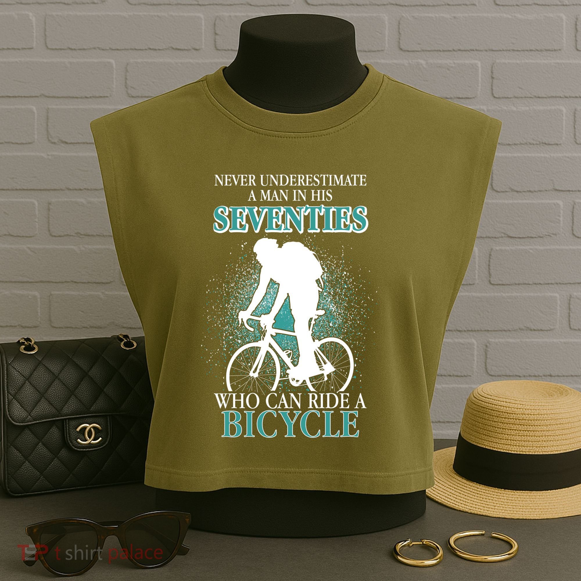 Never Underestimate A Man In His Seventies Who Can Ride A Bicycle Garment-Dyed Women's Muscle Tee