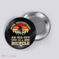 Never Underestimate An Old Guy On A Bicycle Funny Cycling Button thumb 0