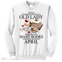 Never Underestimate An Old Lady Who Reads Many Books Gift Sweatshirt thumb 0