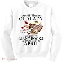 Never Underestimate An Old Lady Who Reads Many Books Gift Kids Sweatshirt thumb 0