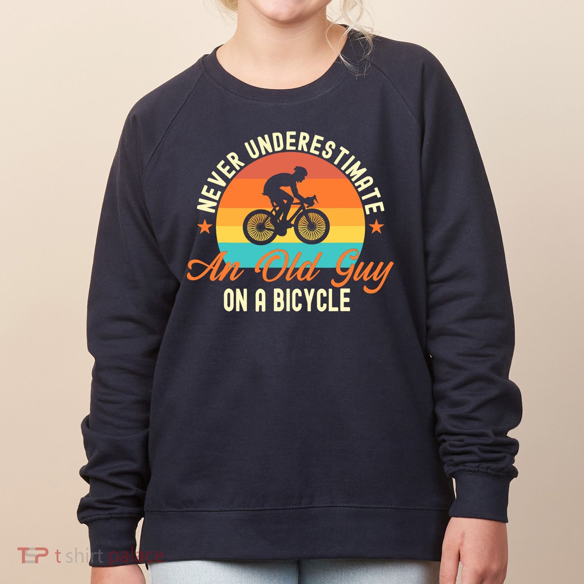 Never Underestimate An Old Guy On A Bicycle Cycling Women's Sweatshirt