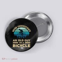 Never Underestimate An Old Guy On A Bicycle Funny Cycling Button thumb 0