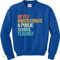 Never Underestimate A Public School Teacher Harris Walz 2024 Kids Sweatshirt thumb 0